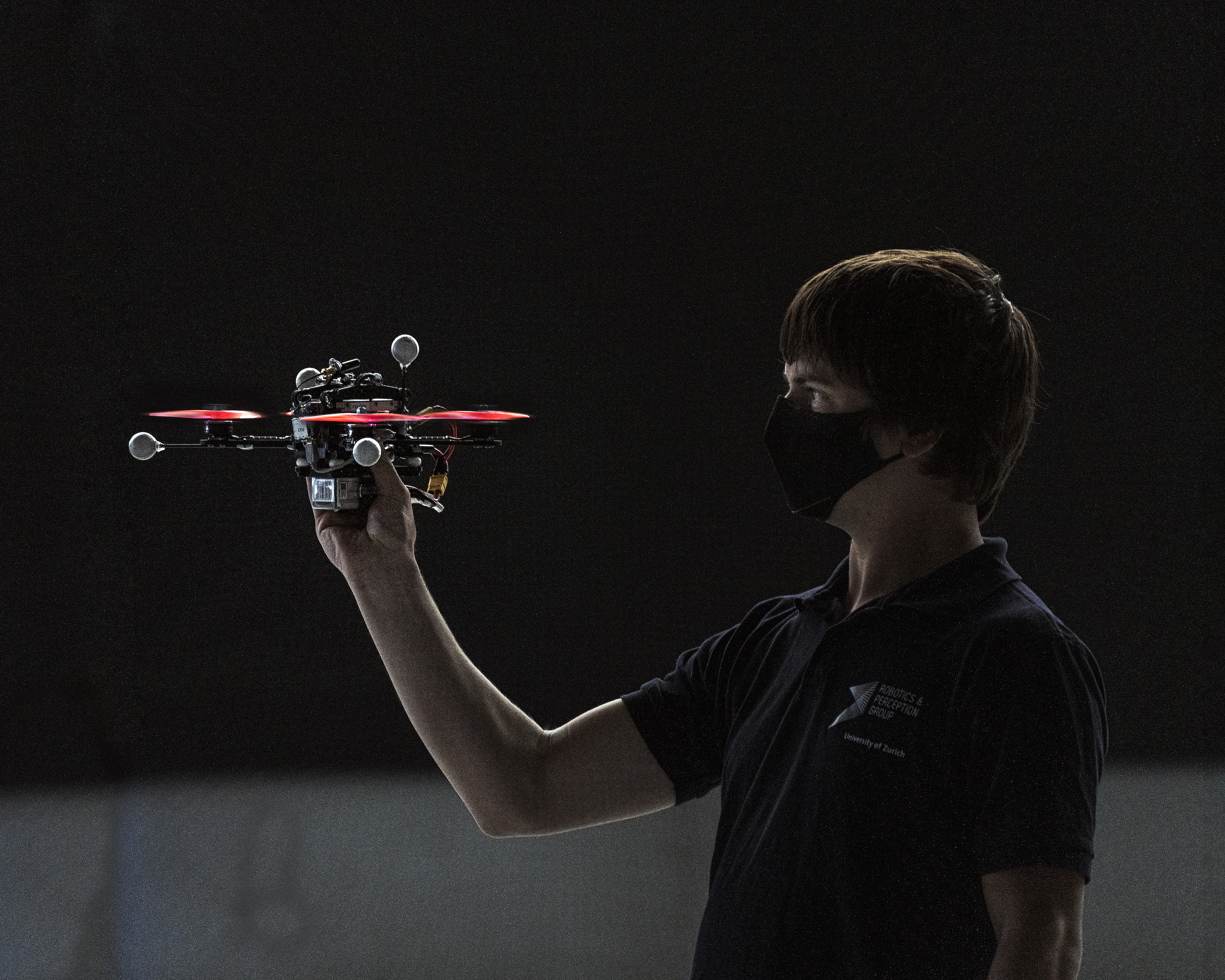 A young researcherinteracts with a drone that is capable of avoiding obstacles, humans included, in a totally autonomous way. 

Robotics and Perception Group, University of Zurich