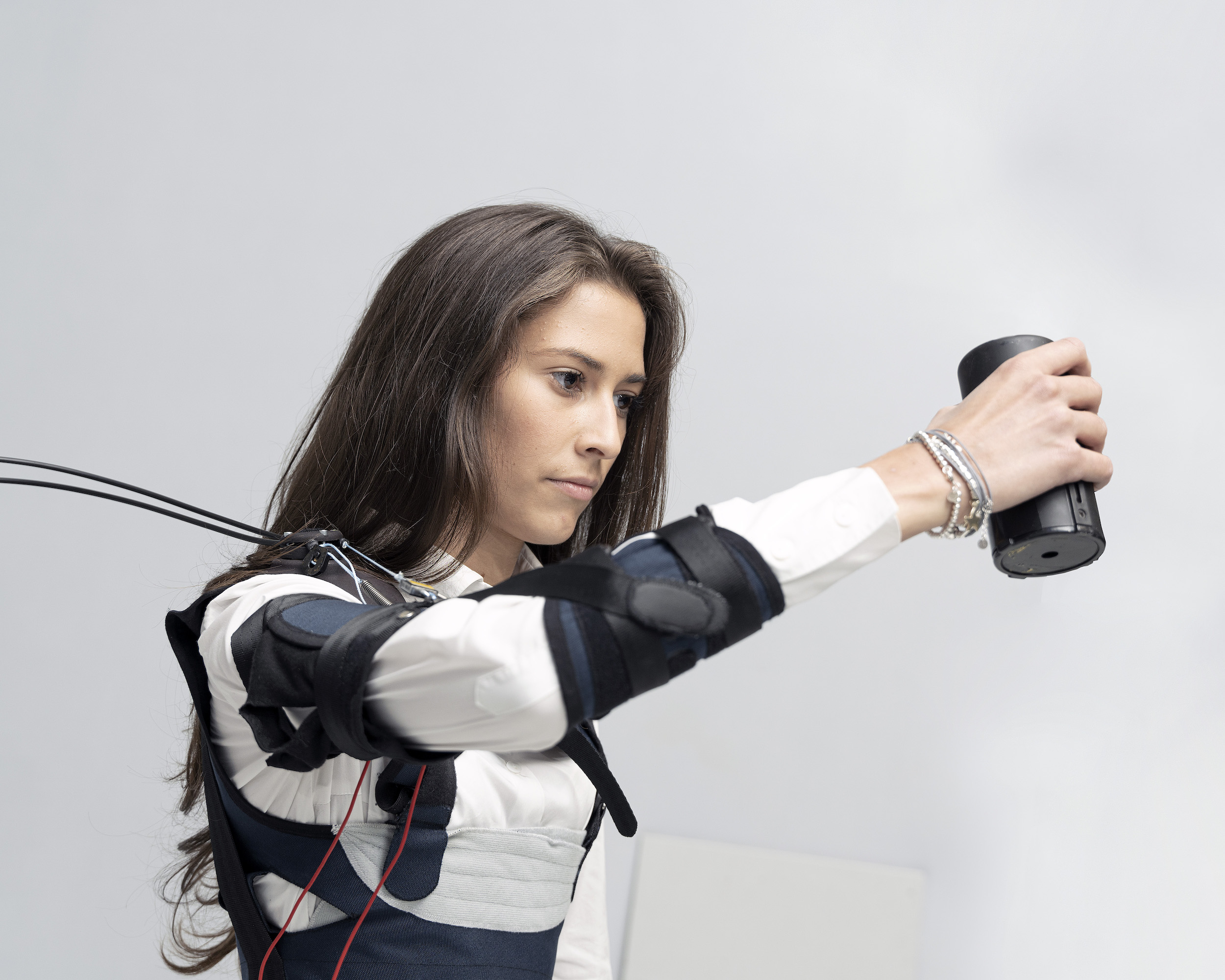 The Myoshirt provides additional strength to the arms. 

Sensory-motor systems lab, ETH Zurich.